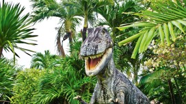 Dinosaur hides in the foliage in the park