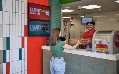Takeaway Papa Johns pizza at the caravan
