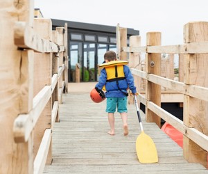 The jetty at the lake and canadian canoes