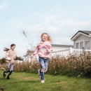 One of the accommodation areas at Seton Sands with lovely planting near the holiday home