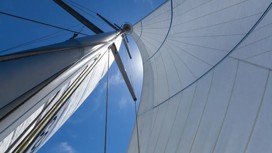 Mast and sails, close up shot from the deck looking up 