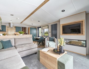 The spacious lounge area inside an ABI Ingleton caravan.
