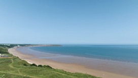 The section of the beach between Filey and the park.