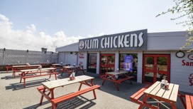 Outdoor seating area of Slim Chickens