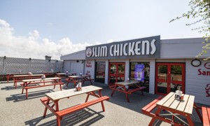 Outdoor seating area of Slim Chickens