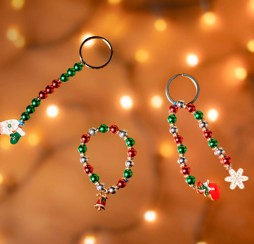 Festive friendship bracelets and keyrings made with beads and charms.