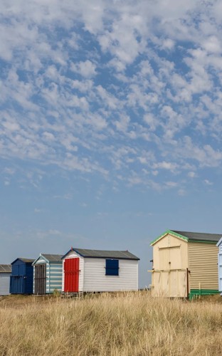 Colourful beach huts at Hayling Island, Hampshire.