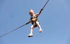 Kids can reach for the stars when they bounce about on the bungee trampoline.