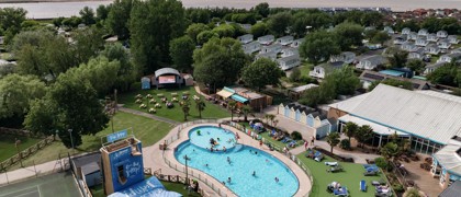An aerial view of Burnham-on-Sea's Adventure village, with the coastline just visible behind it.