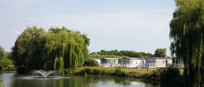 A view of some caravans along a lake at Cleethorpes Beach