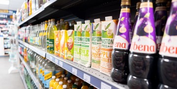 Soft drinks and cordials on the shelves of Kent Coast's on-park supermarket.