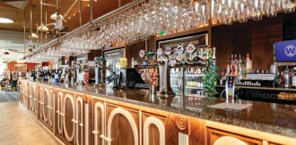 The bar inside The London Stone J D Wetherspoon pub at Kent Coast Holiday Park.