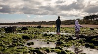 Rock pooling at the beach opposite Seton Sands