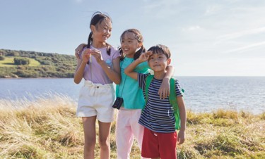 Kids playing freely at the coast at Littlesea