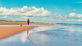 Walking along a Northumberland beach
