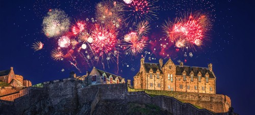 Fireworks in the skies above Edinburgh Castle, Scotland.