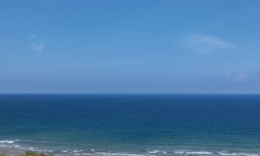 Family by the beach at Perran Sands