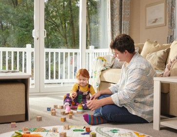 Family playing games in a caravan