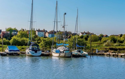 Boats moored in the creek at Oare near Faversham