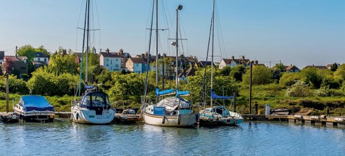 Boats moored in the creek at Oare near Faversham