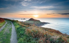 A view of sunset on the South West Coast Path at Cornwall