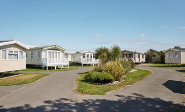 One of the lovely landscaped holiday home areas at Church Farm.