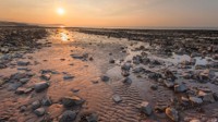 The rocky beach at Doniford Bay
