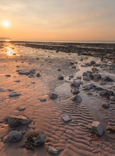 The rocky beach at Doniford Bay