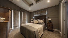 Representation of a main bedroom in a Exclusive Sea View Luxury Lodge