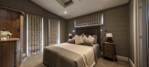 Representation of a main bedroom in a Exclusive Sea View Luxury Lodge