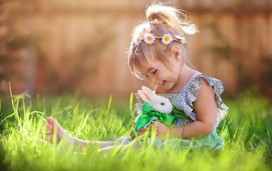 Cute little girl with a bunny rabbit