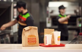 Family selecting their order on the screens at Burger King®