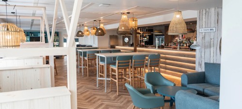 The interior seating and bar area at Kent Coast Yacht Club