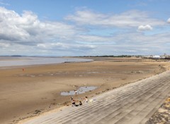 The beach and promenade opposite the park