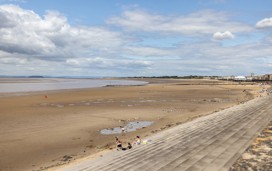 The beach and promenade opposite the park