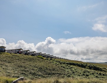 Boys playing outside the caravan