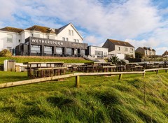 A view of the exterior of the J D Wetherspoon at Riviere Sands