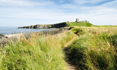 A view of Dunstanburgh Castle in Northumberland.