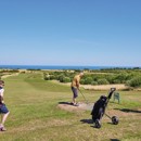 Golfers on one of the holes at the golf course at Reighton Sands