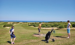Golfers on one of the holes at the golf course at Reighton Sands
