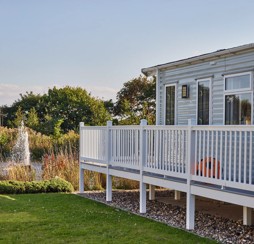 Representation of the view and the wraparound deck in a Signature Gold caravan at Blue Dolphin