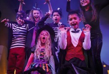 Kids dance around together at Haven in their finest Halloween fancy dress outfits.
