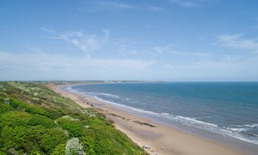 The view of the beach at Reighton Sands taken from a drone