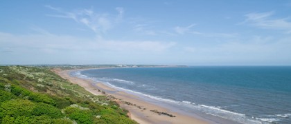 The view of the beach at Reighton Sands taken from a drone
