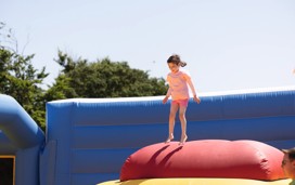 The colourful new Inflatable Arena at Haven Devon Cliffs - a new activity for 2023